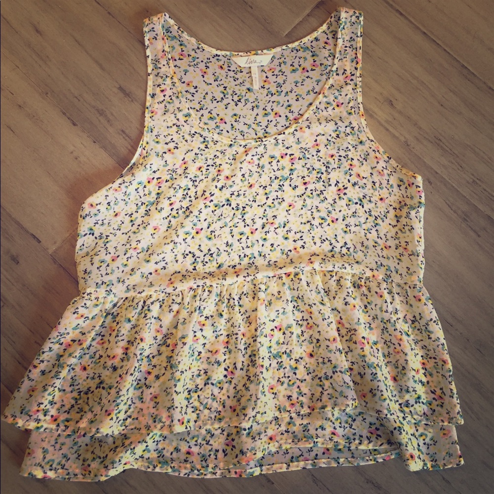 Bohemian ruffle bottom floral tank